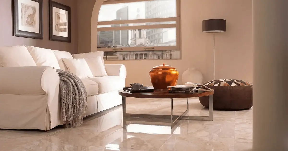 Modern living room with professionally installed marble flooring, a beige sofa, coffee table in Madison, WI