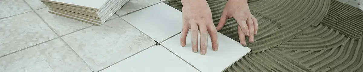 Professional installing white tile floors in Madison, WI