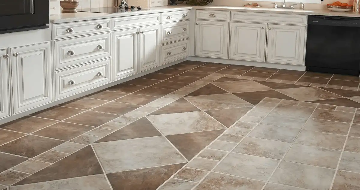 Kitchen with white cabinets and a professionally installed tile floor in Madison, WI