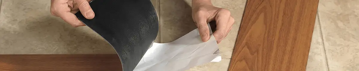 A professional installing vinyl flooring in Madison, WI